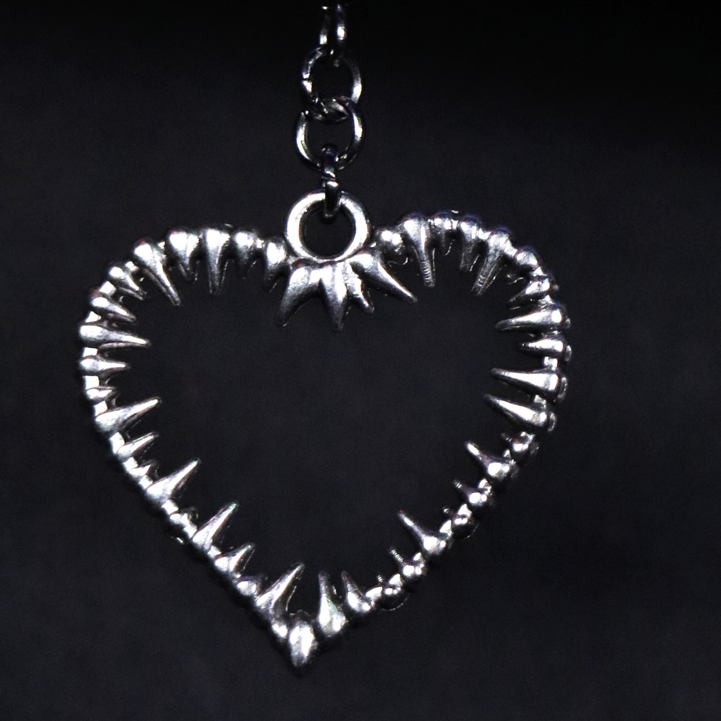 Detail photo Handmade stainless steel drop earrings with spiked hollow zamac hearts , RAVEBOUND