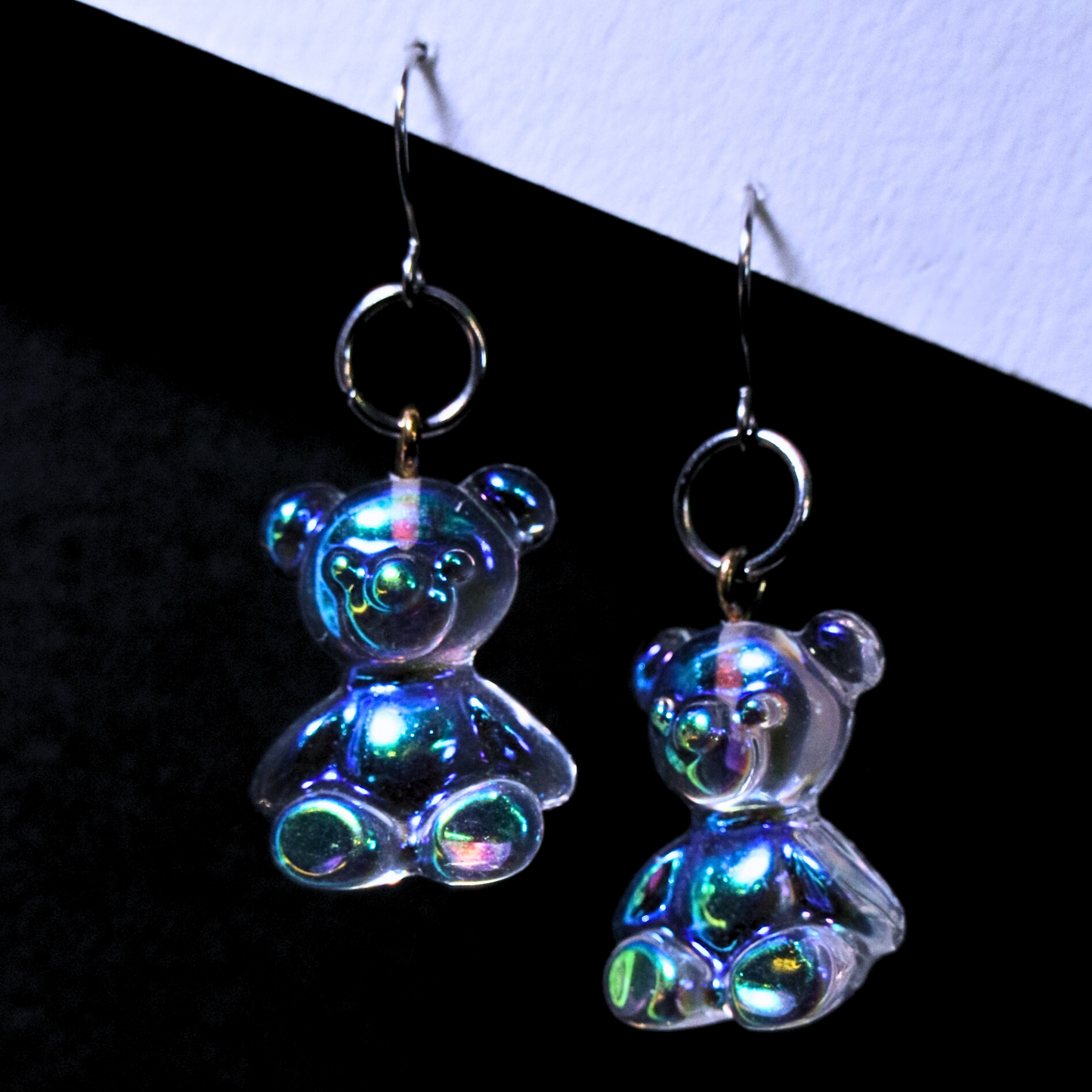 Handmade iridescent bear earrings with stainless steel hooks. Ravebound