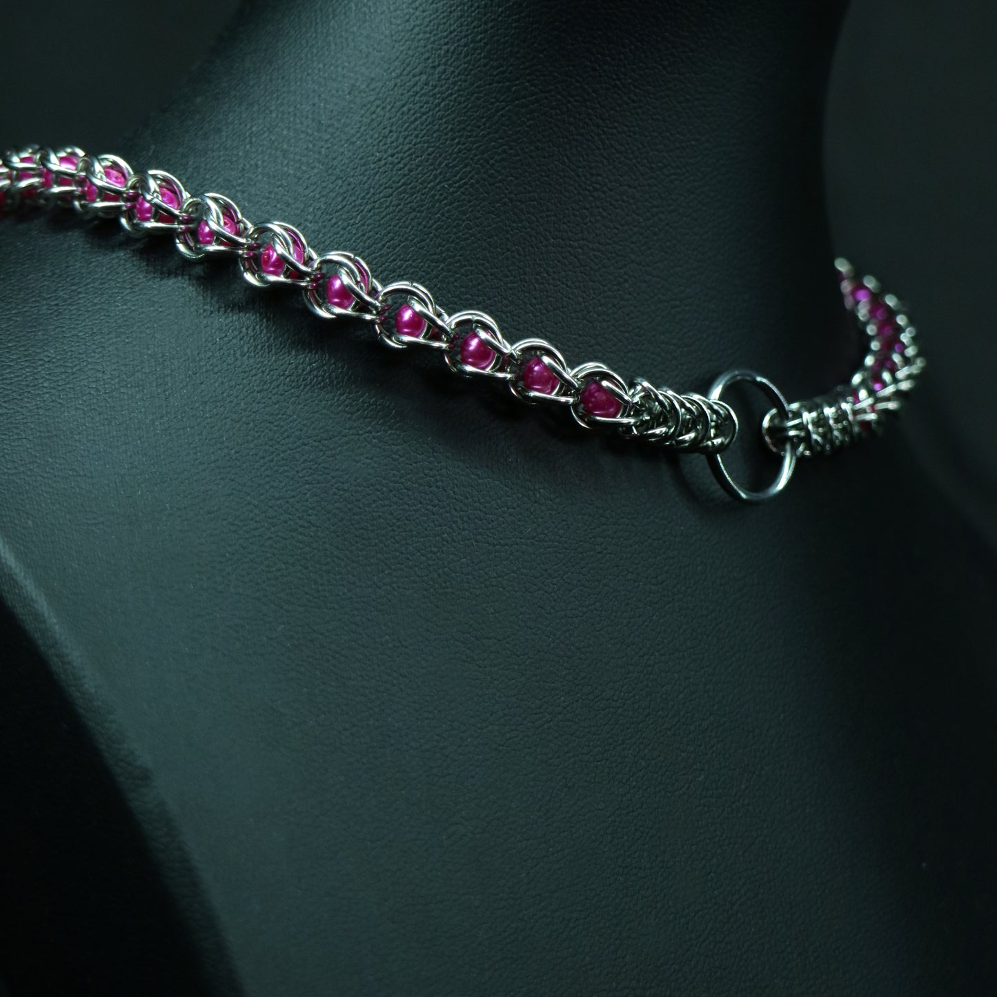 Stainless-steel chainmail choker in silver and glass pearl accents.