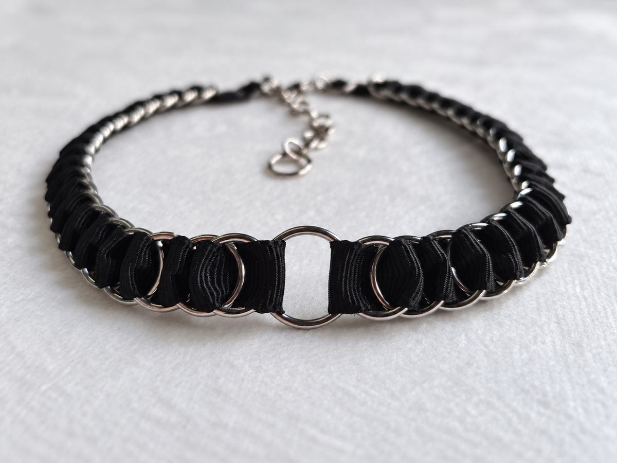 Front detail of the LOOM black fabric ribbon chainmail choker and central stainless steel O-ring.