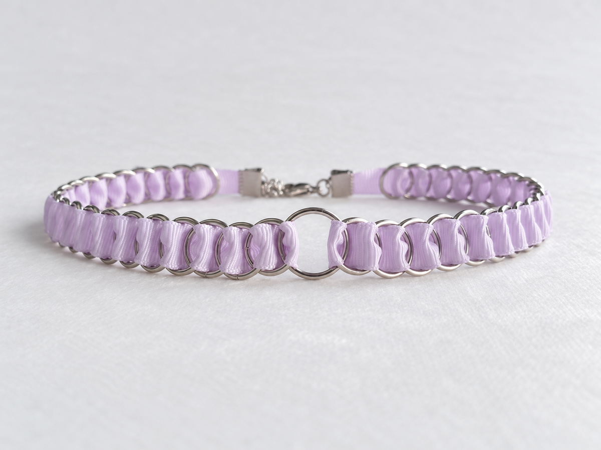 Low front view of the LOOM lilac fabric ribbon chainmail choker showing the stainless steel O-ring and ribbon texture.