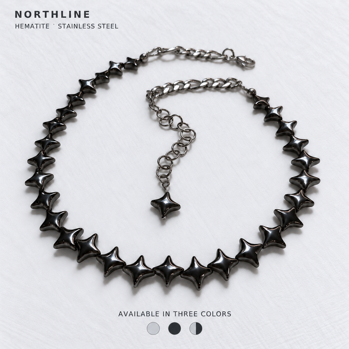 NORTHLINE Gunmetal North Star hematite choker with stainless steel chains. Cover reads Hematite · Stainless Steel and Available in Three Colors, with Silver, Gunmetal and Mixed swatches.